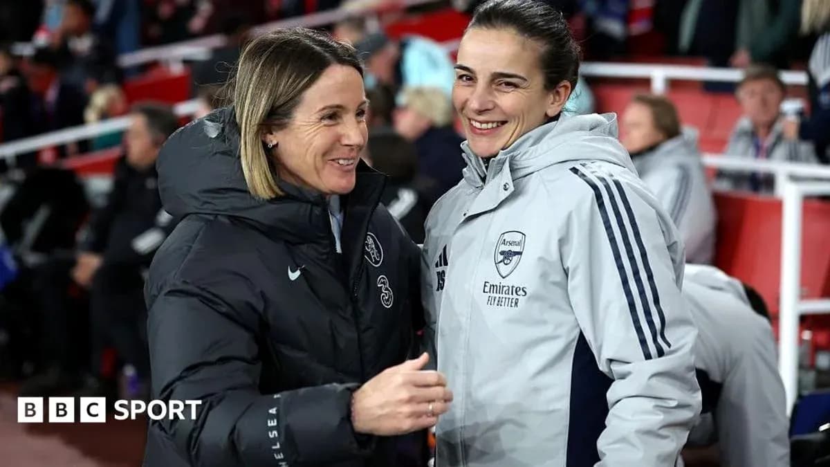 Coaches from Chelsea and Arsenal smiling together Coaches from Chelsea and Arsenal smiling together