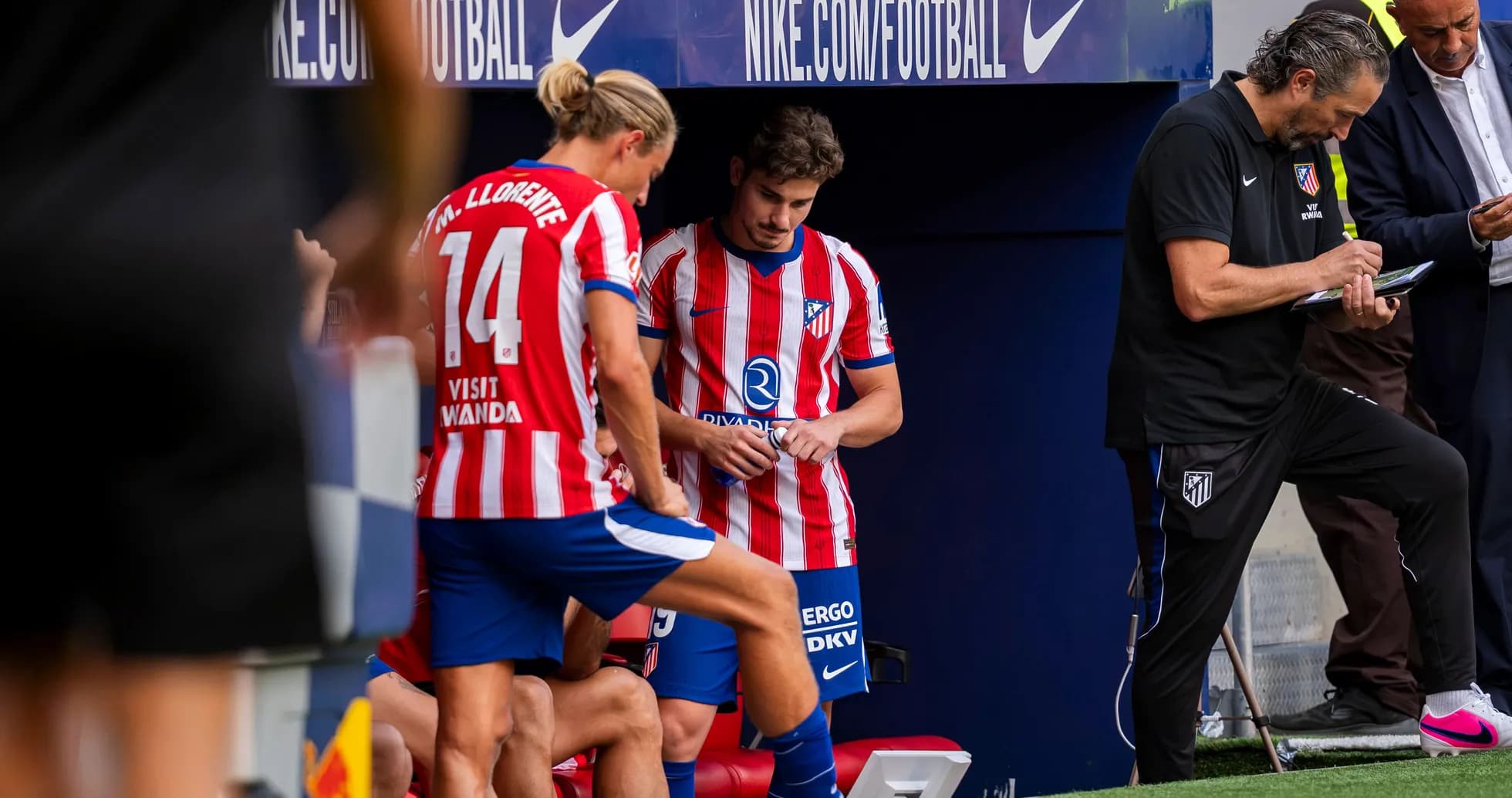 Atletico Madrid players on bench during match Atletico Madrid players on bench during match