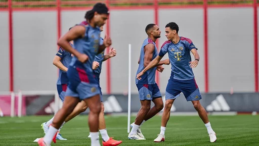 Players training on the pitch during practice session Players training on the pitch during practice session