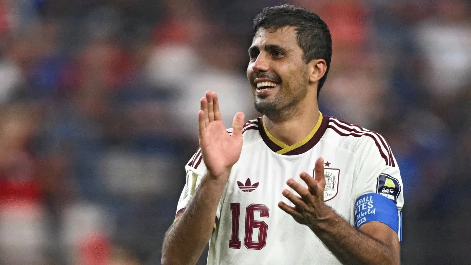 Player celebrating and applauding during match Player celebrating and applauding during match