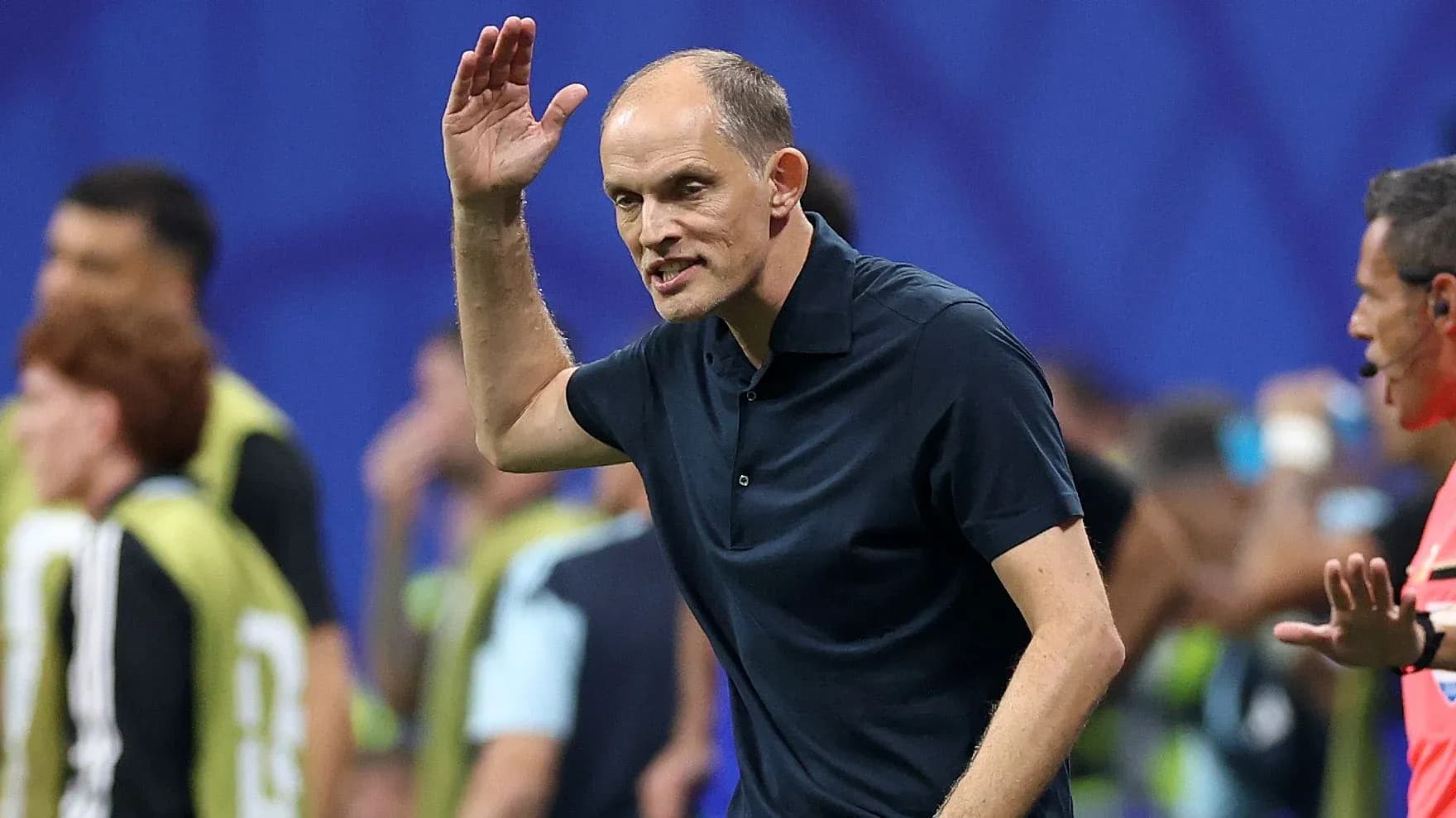 Coach gesturing during a football match on sidelines Coach gesturing during a football match on sidelines