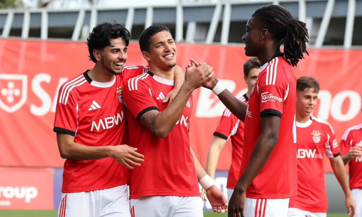 Benfica players celebrating a goal during match Benfica players celebrating a goal during match
