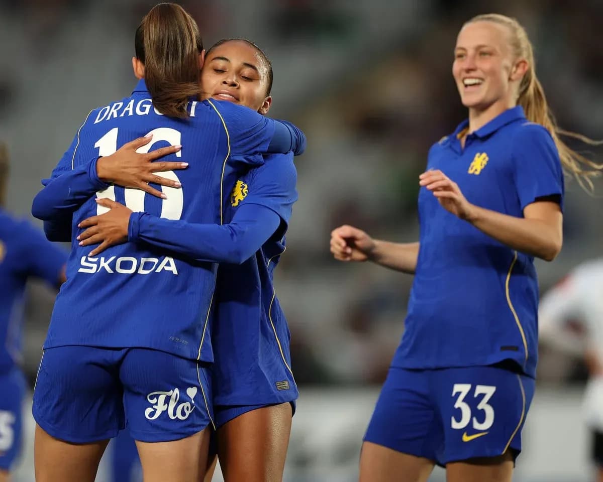 Chelsea W players celebrating during a match Chelsea W players celebrating during a match