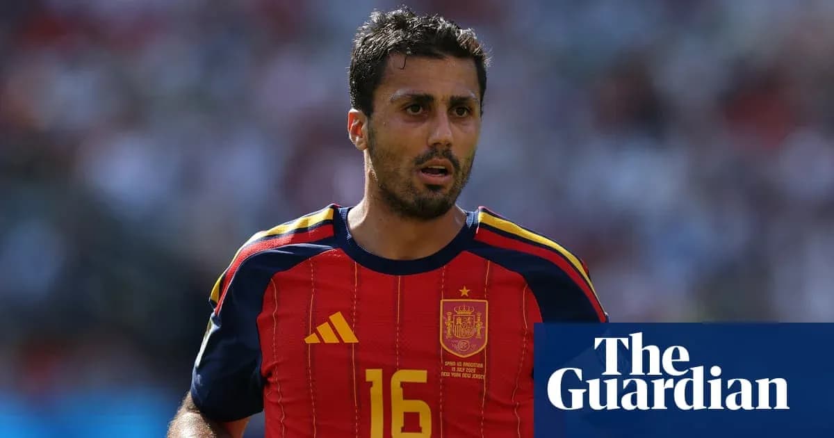 Player in Spain jersey during a football match Player in Spain jersey during a football match
