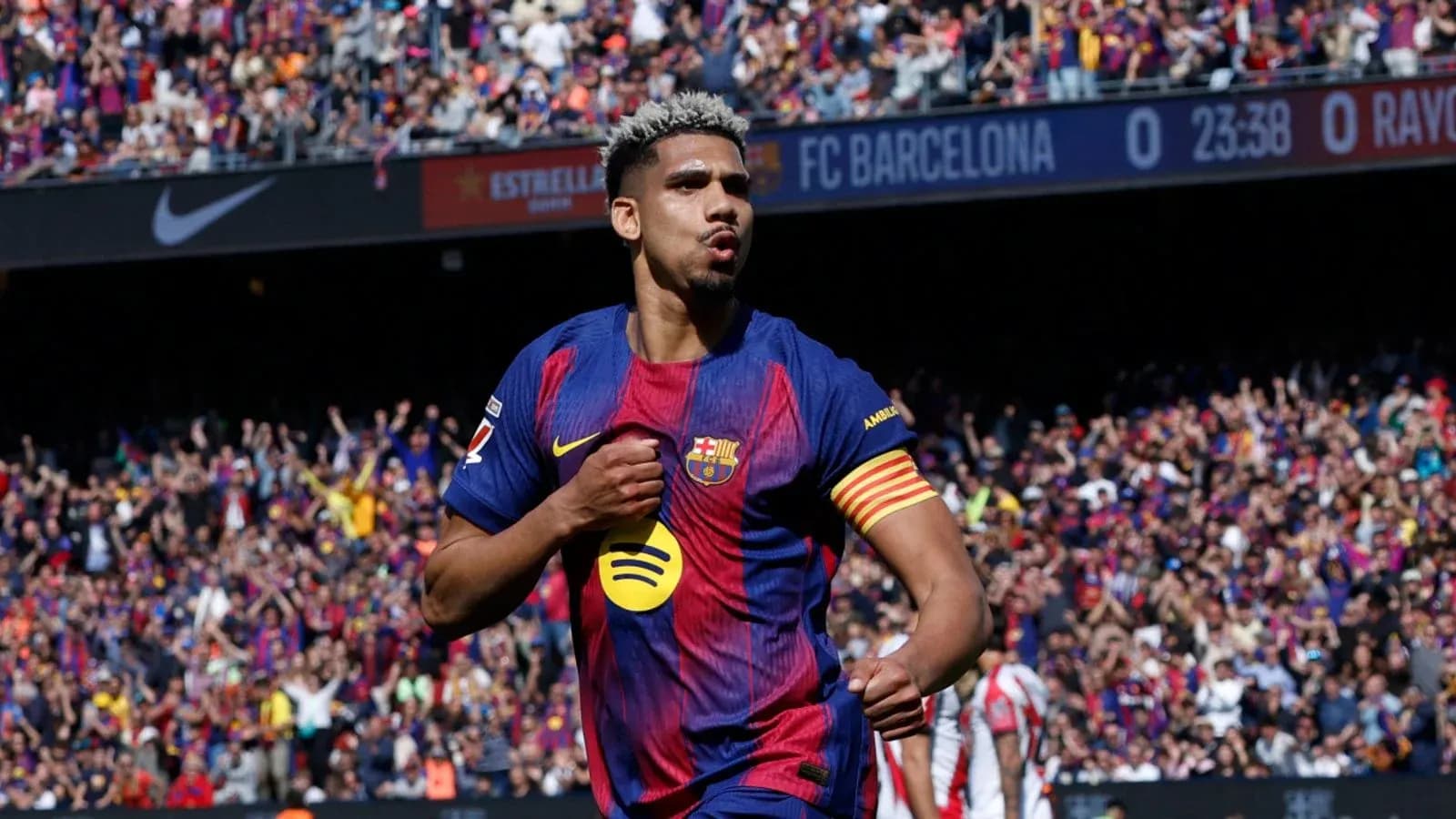Player celebrating goal in FC Barcelona match Player celebrating goal in FC Barcelona match
