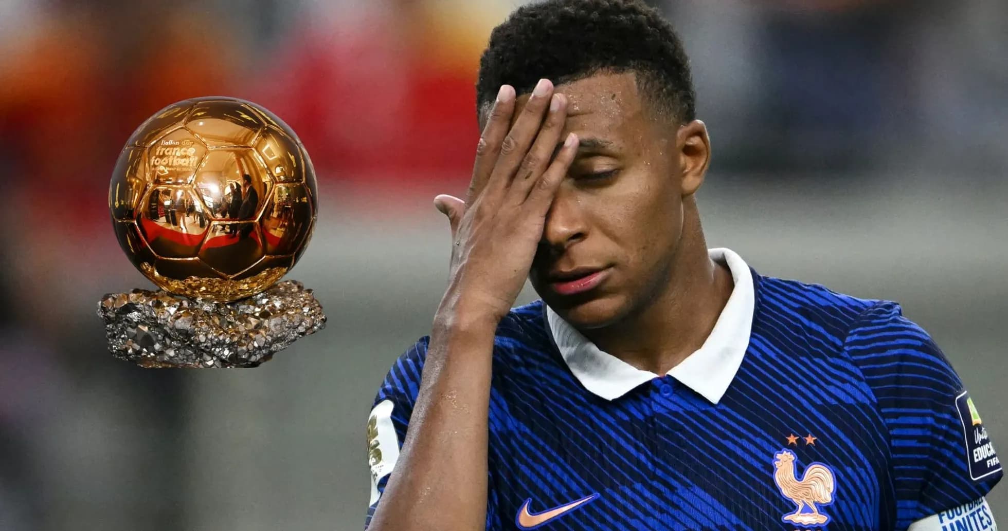 Player in France kit reacts near Ballon d'Or trophy Player in France kit reacts near Ballon d'Or trophy
