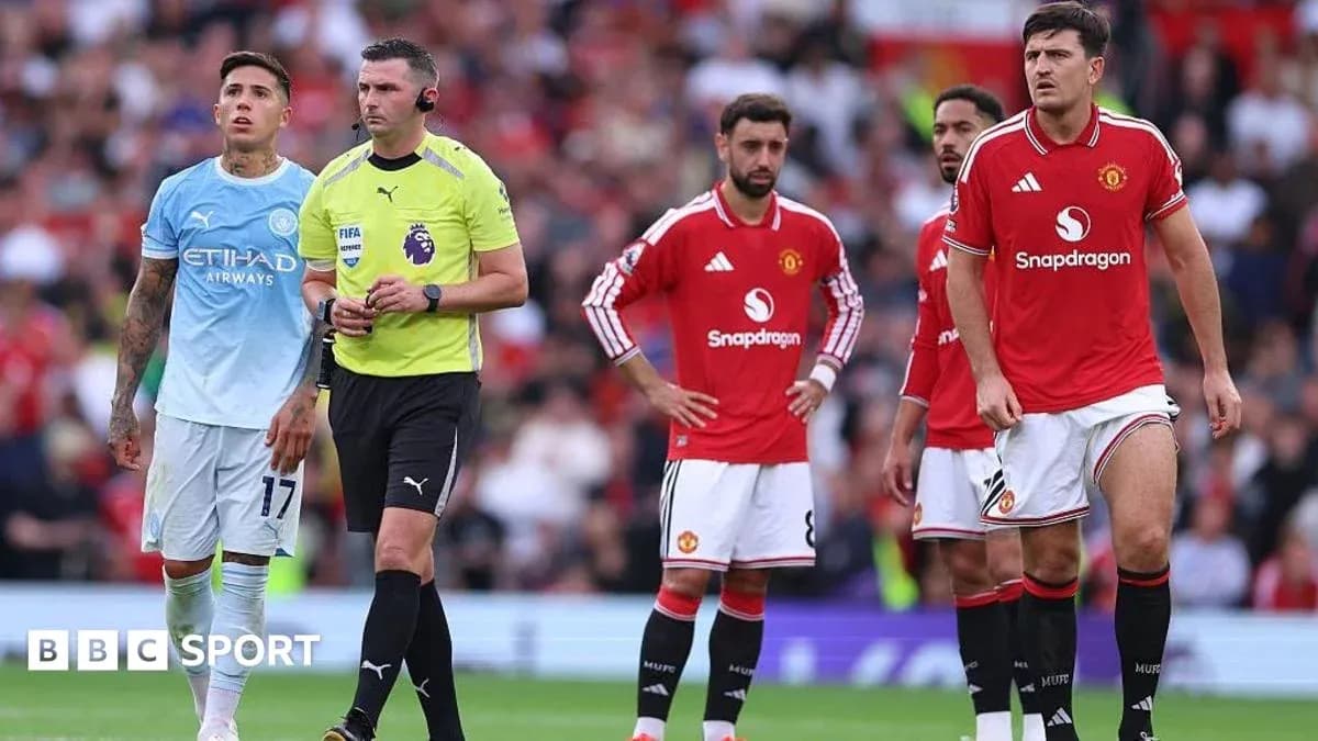 Players from Manchester United and referee during match Players from Manchester United and referee during match