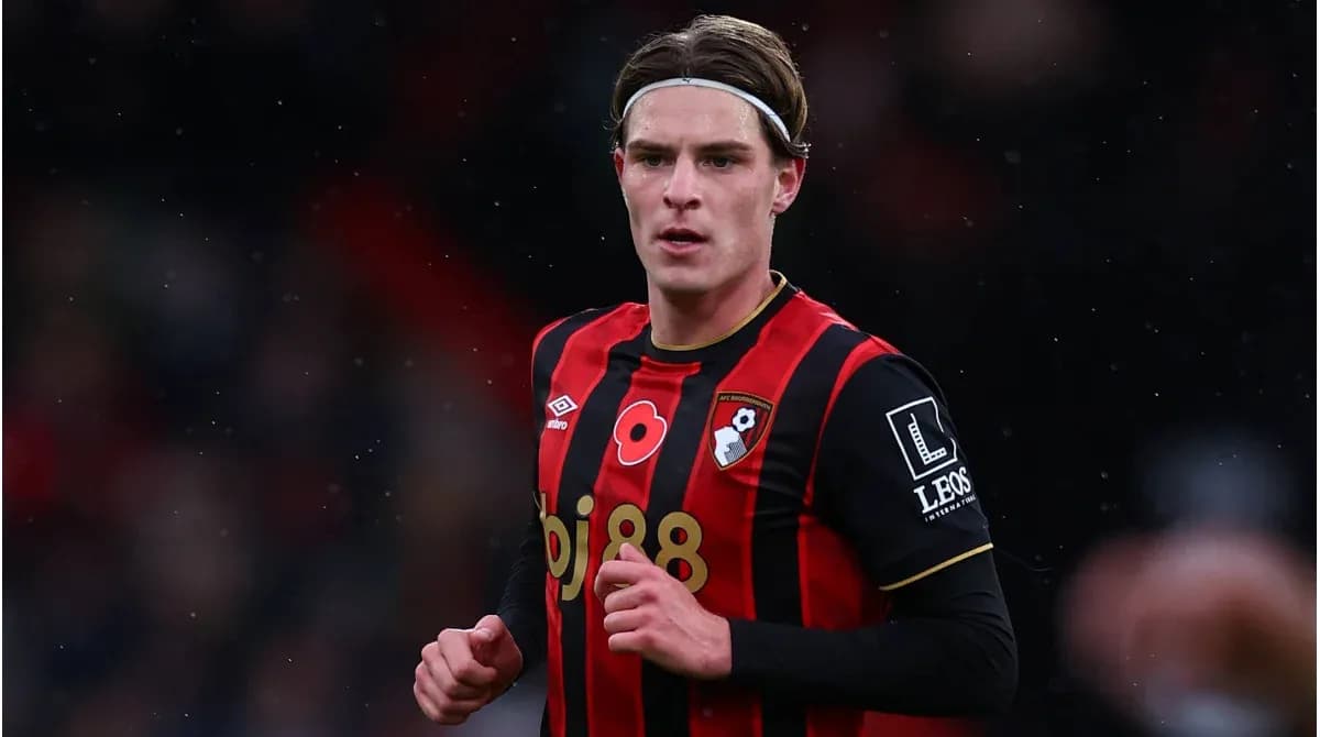 AFC Bournemouth player in red and black kit AFC Bournemouth player in red and black kit