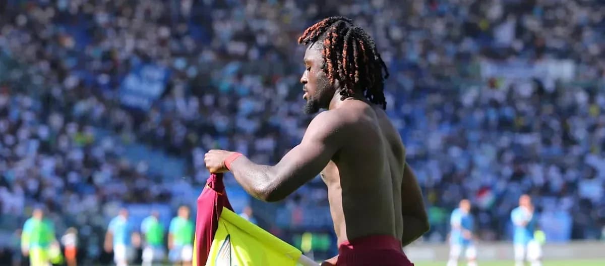 Player removing jersey during match in stadium Player removing jersey during match in stadium