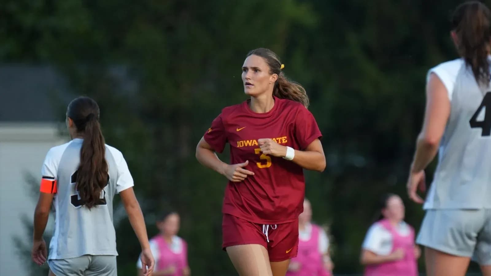 Iowa State player running during soccer match Iowa State player running during soccer match