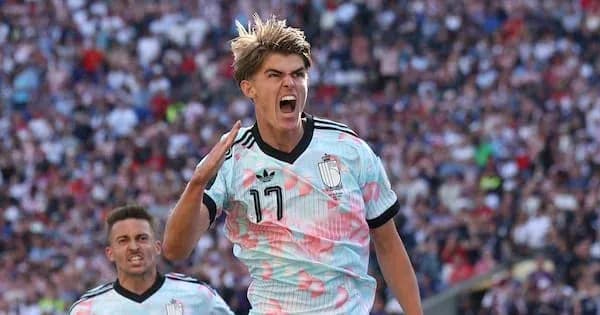 Player celebrating a goal during a match Player celebrating a goal during a match