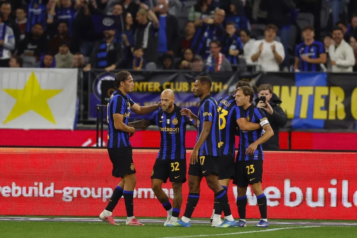 Inter Milan players celebrating a goal together Inter Milan players celebrating a goal together