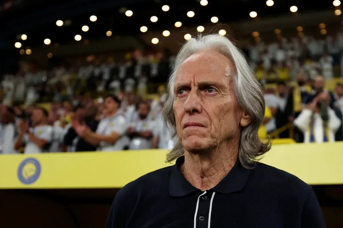 Coach standing on the sidelines during match Coach standing on the sidelines during match