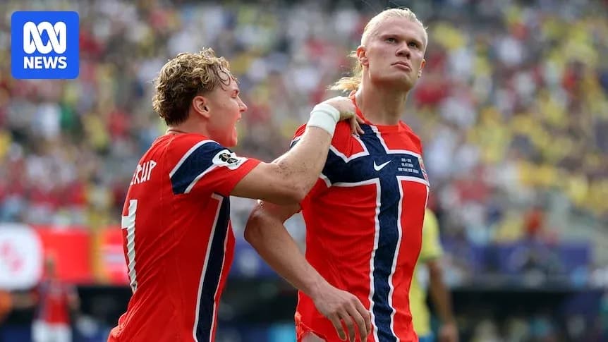 Norwegian players celebrating a goal on the field Norwegian players celebrating a goal on the field