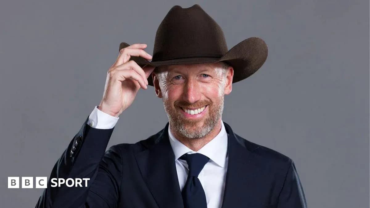 Man in suit tipping cowboy hat and smiling Man in suit tipping cowboy hat and smiling