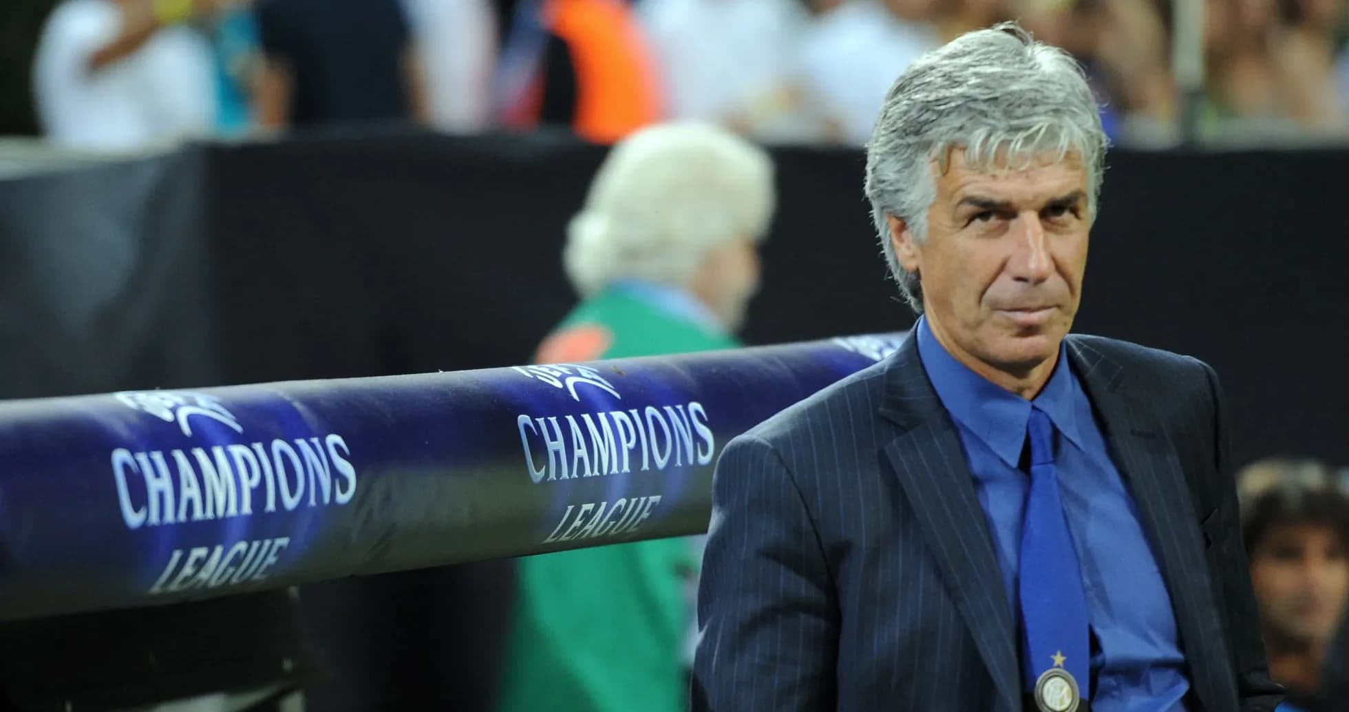 Coach sitting on bench during Champions League match Coach sitting on bench during Champions League match