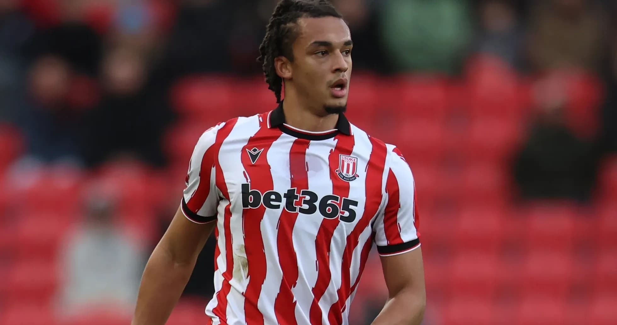 Stoke City player on the pitch during a match Stoke City player on the pitch during a match