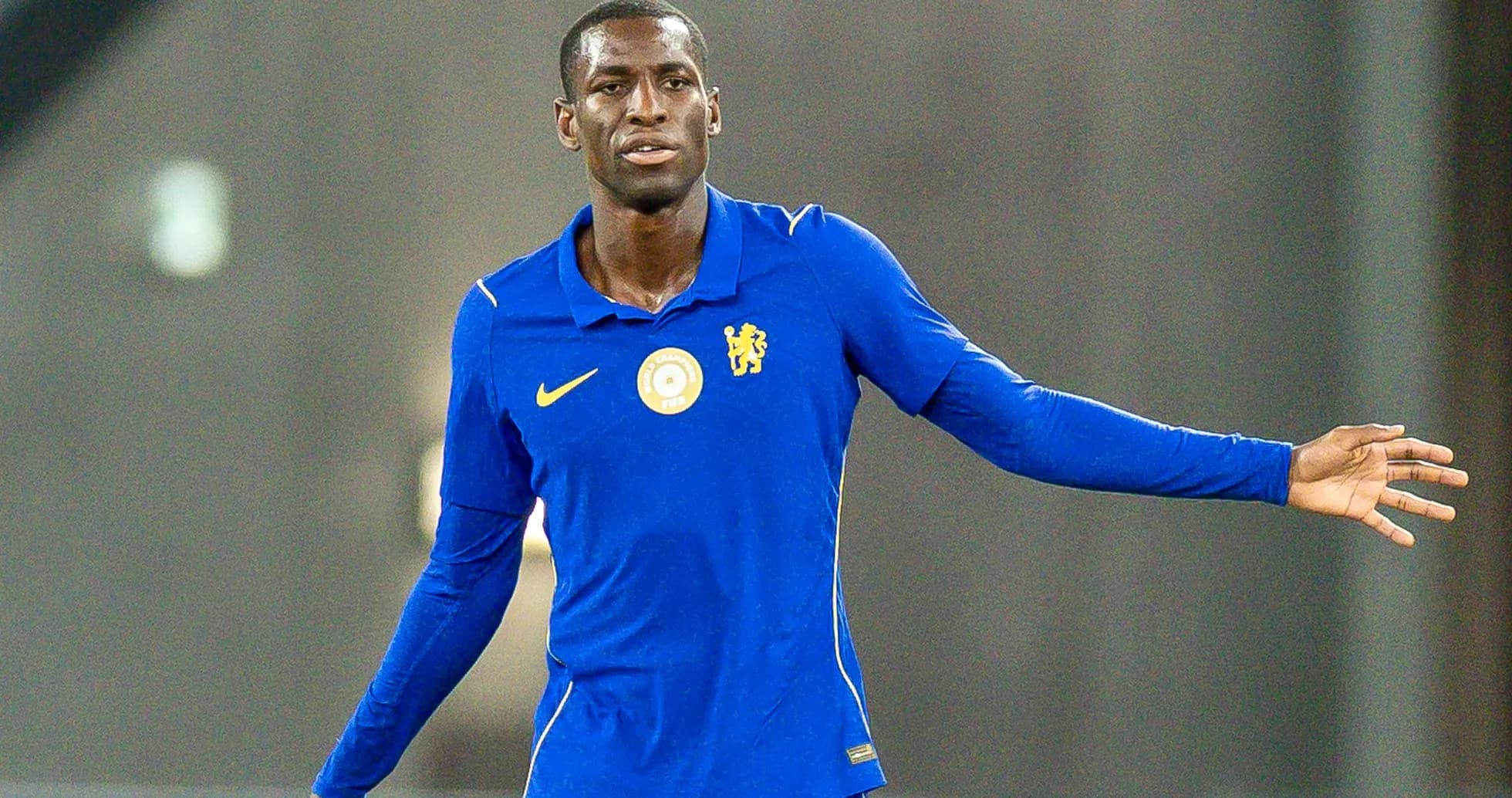 Player in blue jersey gesturing during training session Player in blue jersey gesturing during training session