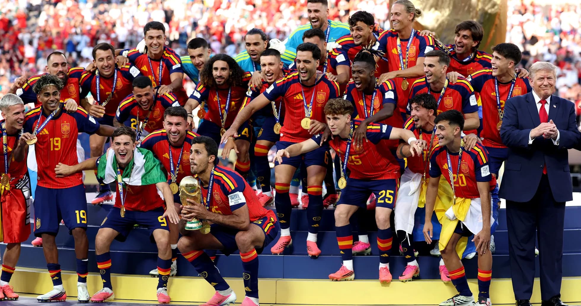 Spain national team celebrating with trophy after victory Spain national team celebrating with trophy after victory