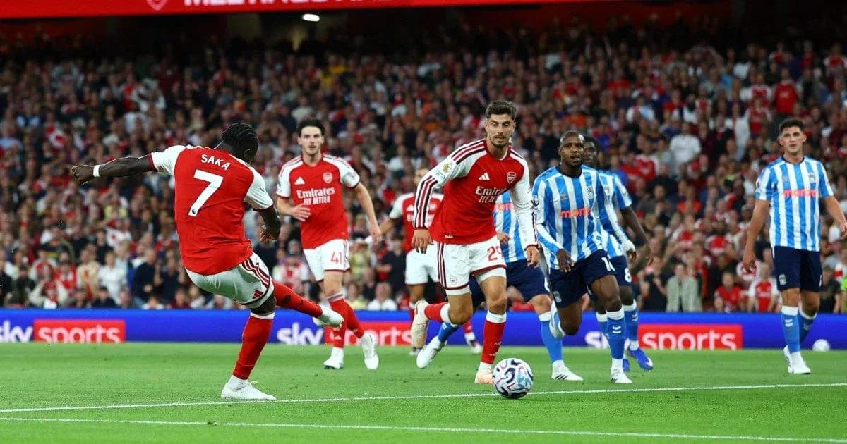 Bukayo Saka taking a shot during the match Bukayo Saka taking a shot during the match