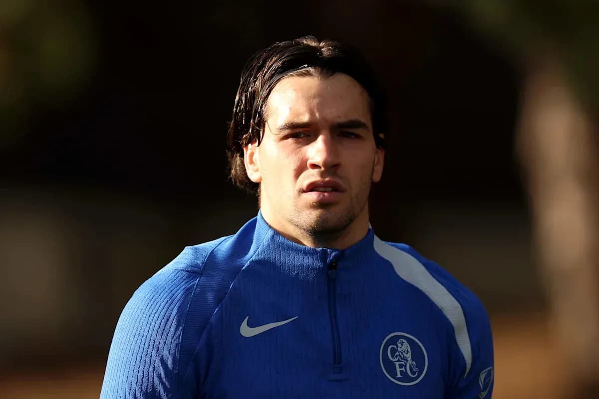 Player in blue training kit during practice session Player in blue training kit during practice session