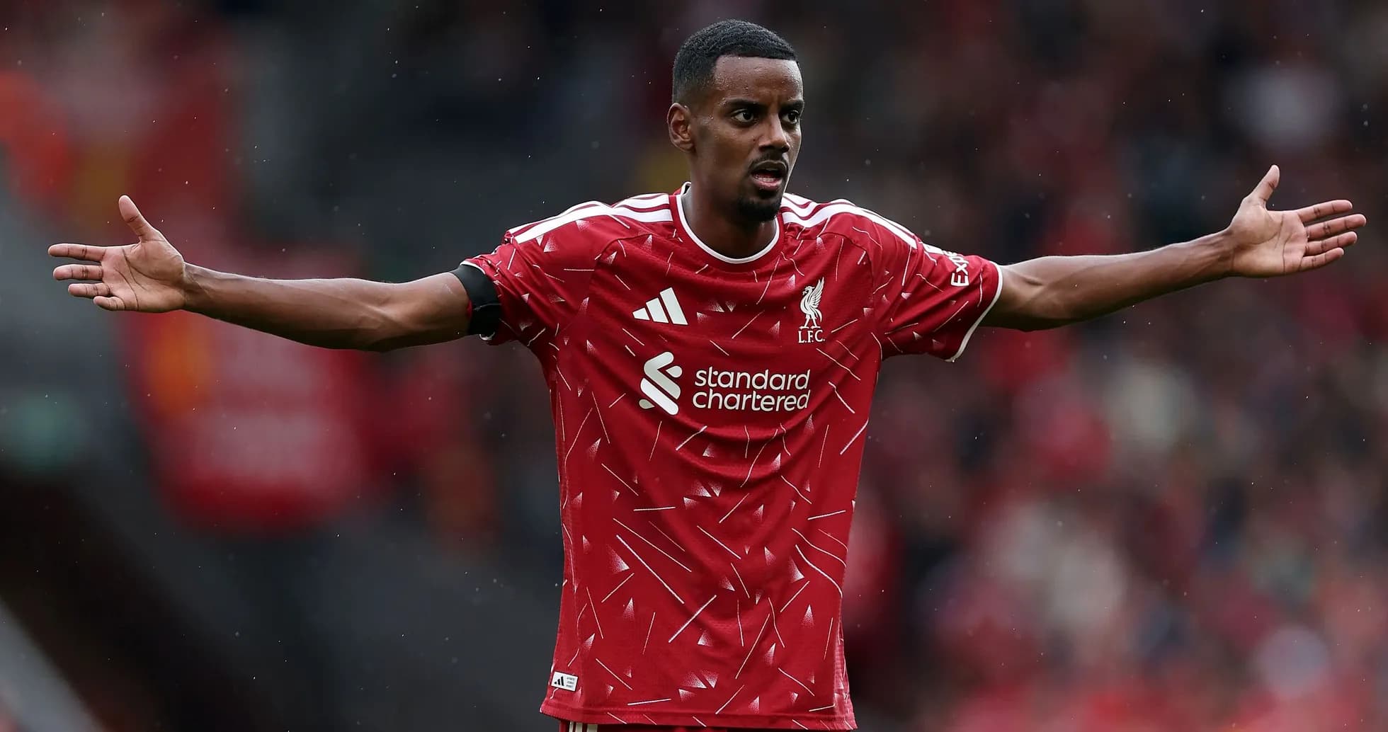 Player gesturing during a match at Anfield Player gesturing during a match at Anfield