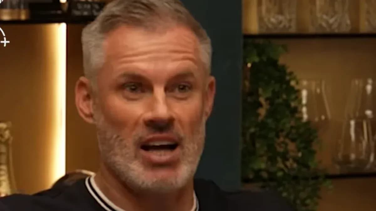 Man speaking during a discussion in a studio Man speaking during a discussion in a studio