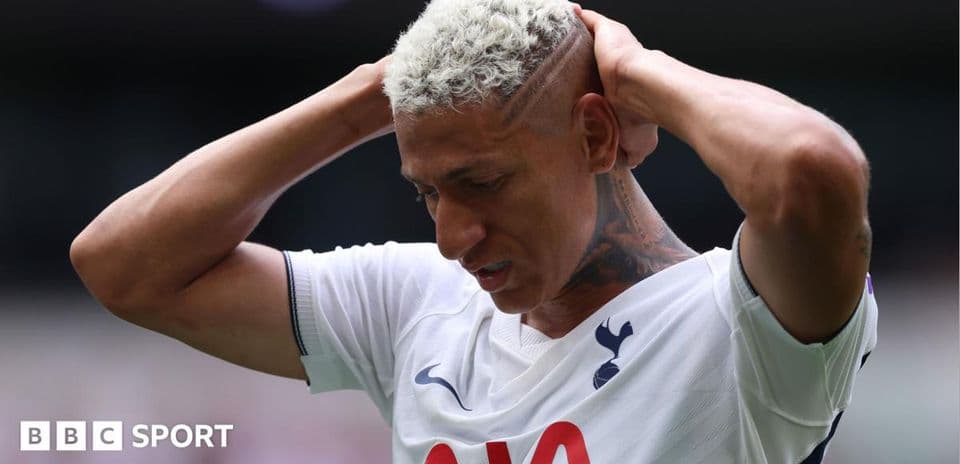 Player holding head in frustration during match Player holding head in frustration during match