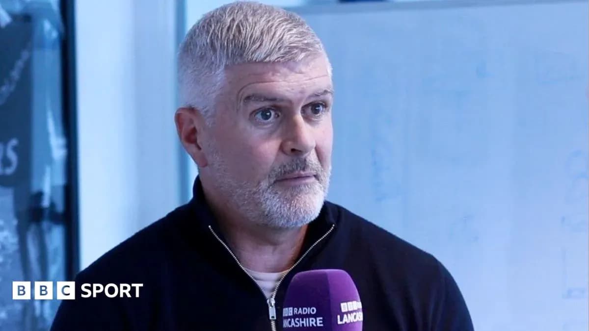Man speaking during an interview with microphone Man speaking during an interview with microphone