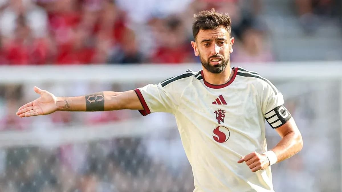 Player gesturing during match in white jersey Player gesturing during match in white jersey