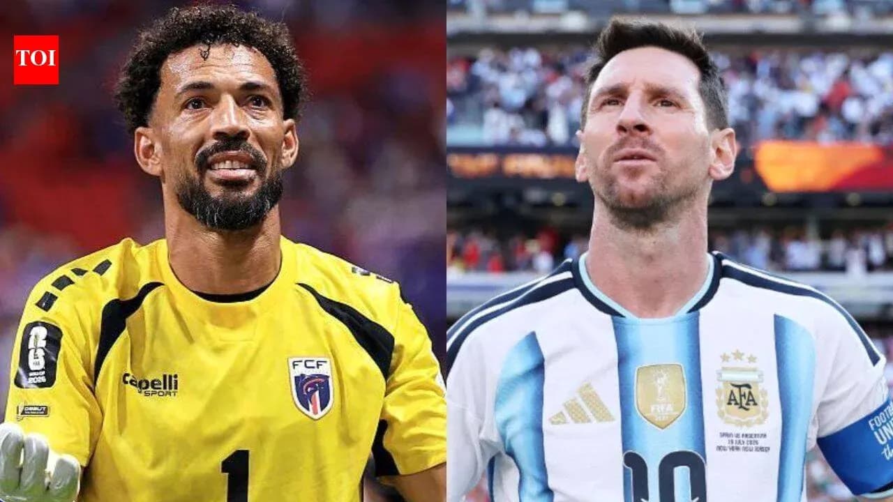 Two football players, a goalkeeper and a forward Two football players, a goalkeeper and a forward