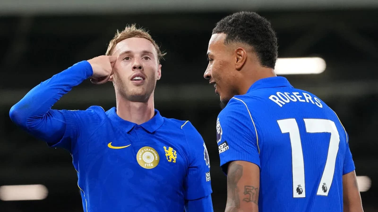 Two players celebrating during a football match Two players celebrating during a football match