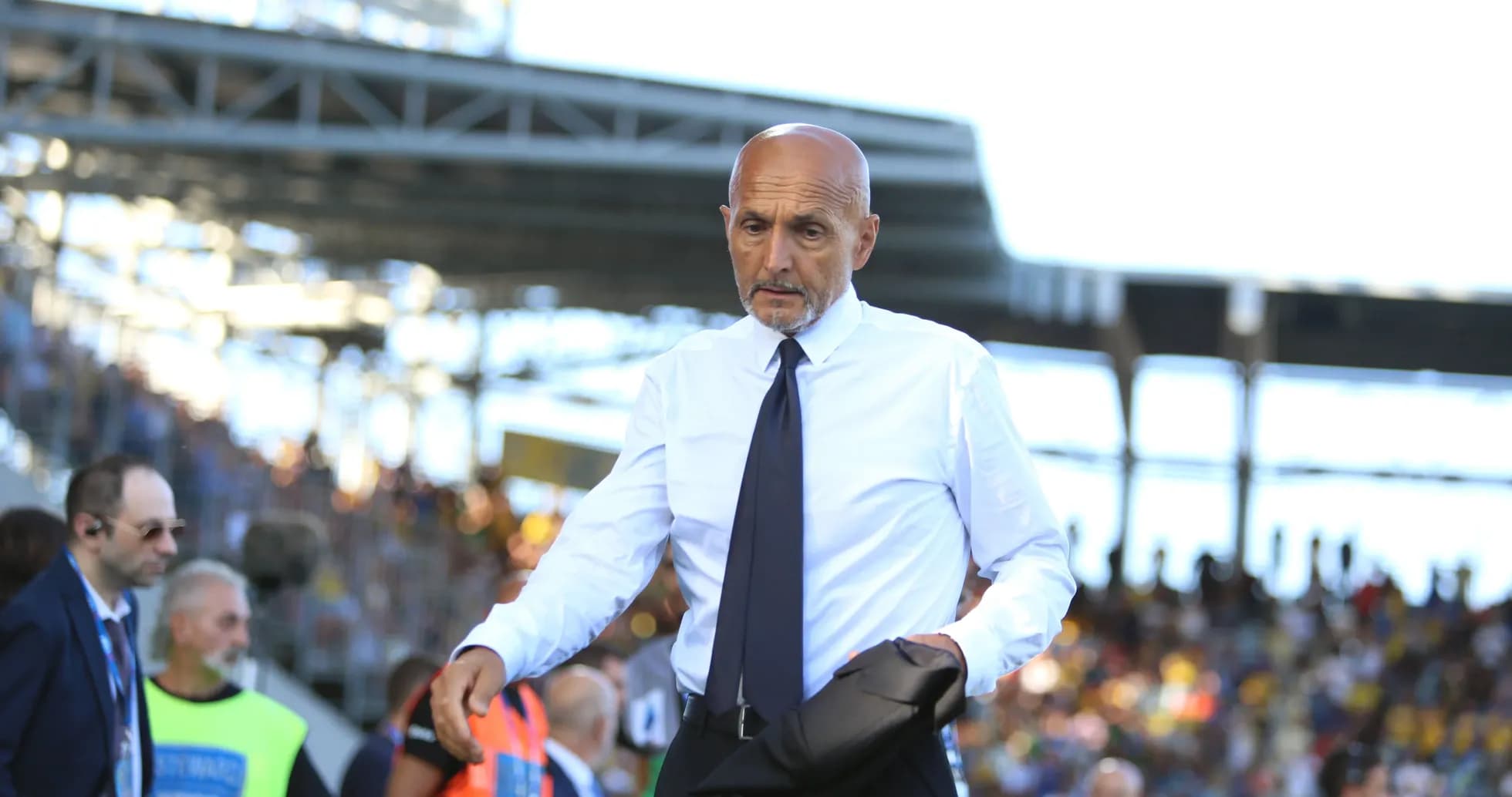 Coach walking on the sideline during match Coach walking on the sideline during match