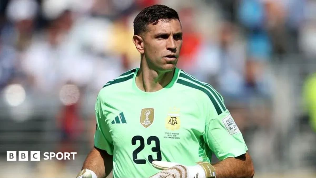 Goalkeeper in green kit during a match Goalkeeper in green kit during a match