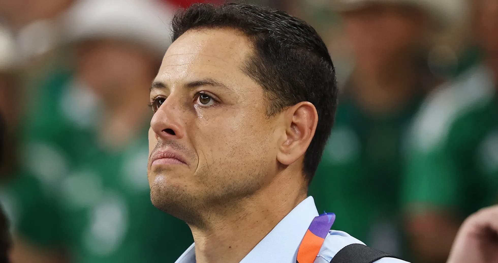 Man with a tear watching a sporting event Man with a tear watching a sporting event