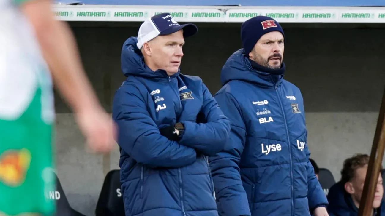 Coaches observing the match from the sidelines Coaches observing the match from the sidelines