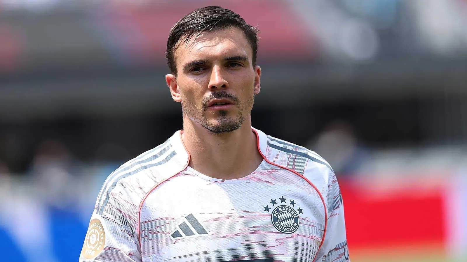 Player in Bayern Munich jersey on the field Player in Bayern Munich jersey on the field