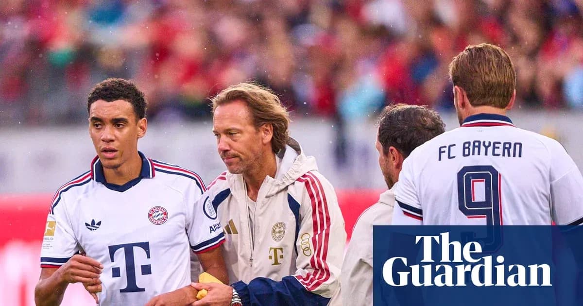 Bayern Munich players on sideline during match Bayern Munich players on sideline during match