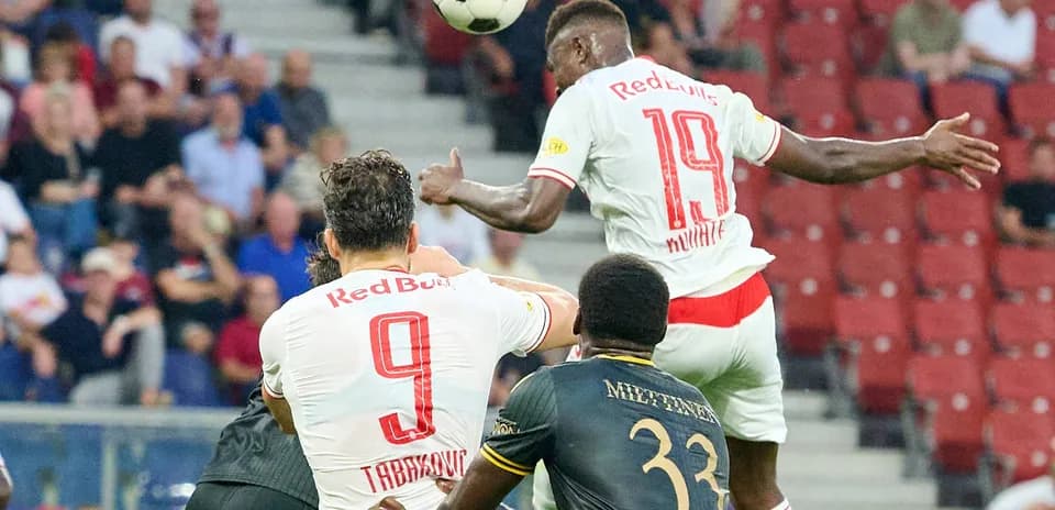 Red Bull Salzburg players competing for the ball Red Bull Salzburg players competing for the ball
