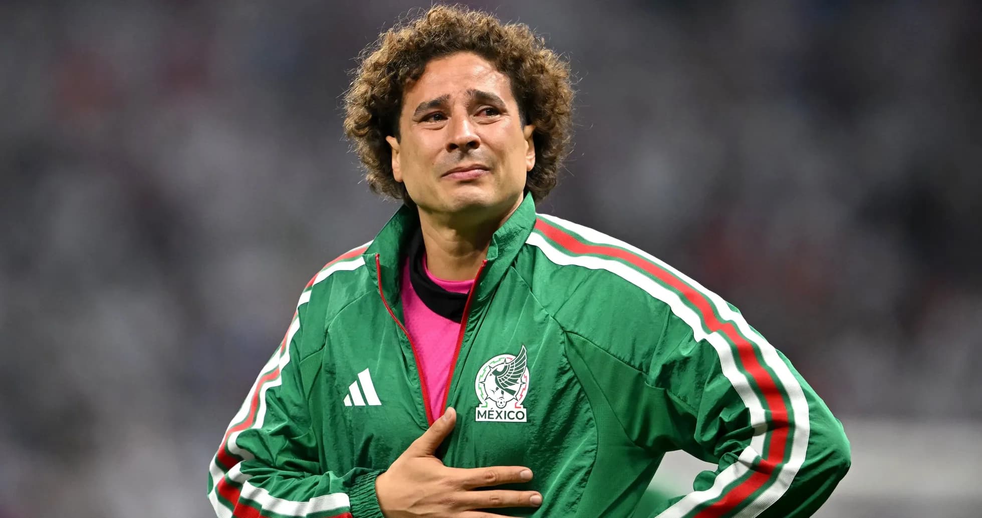 Goalkeeper in green jacket during match Goalkeeper in green jacket during match
