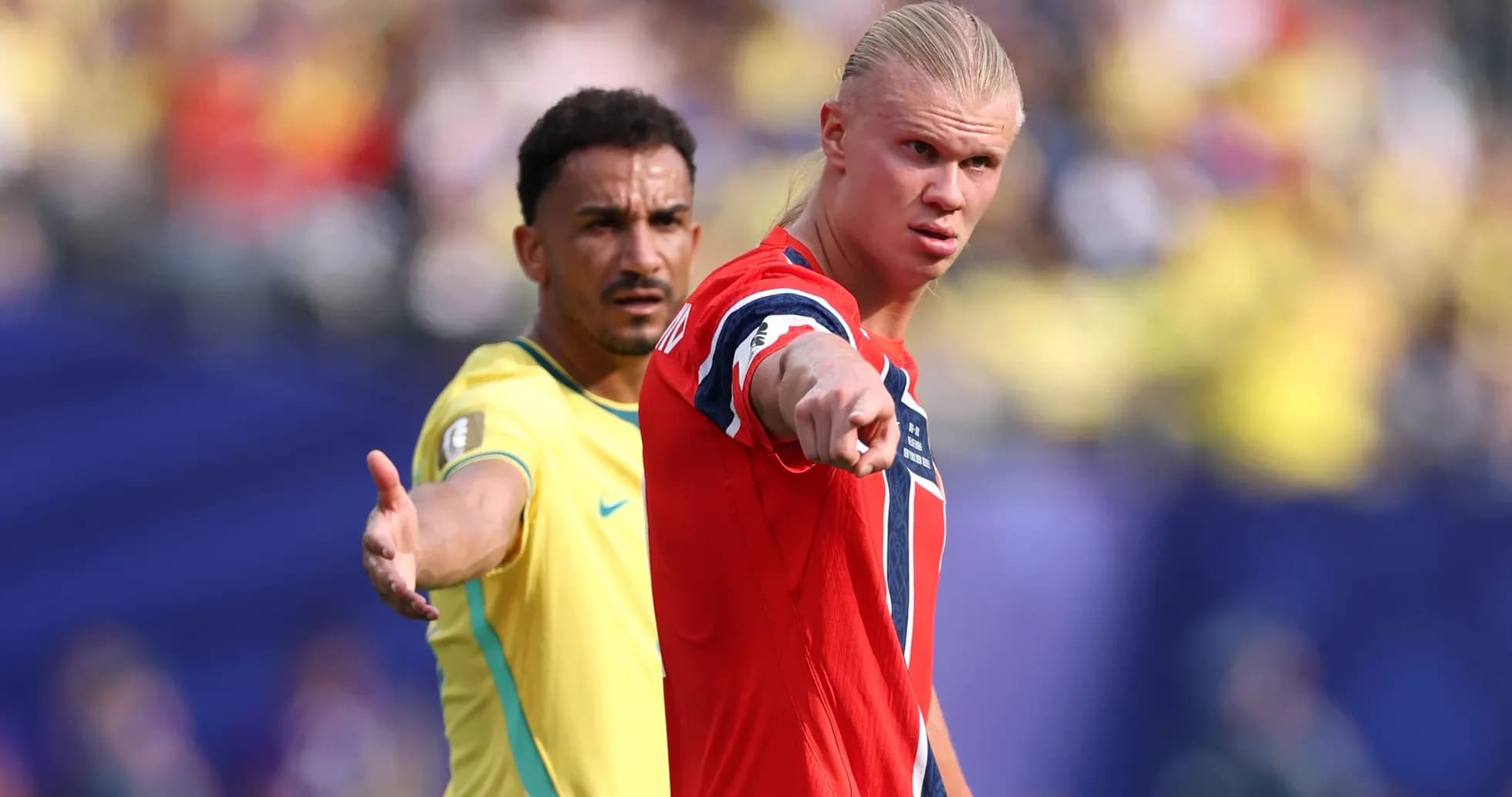 Two players in action during international football match Two players in action during international football match