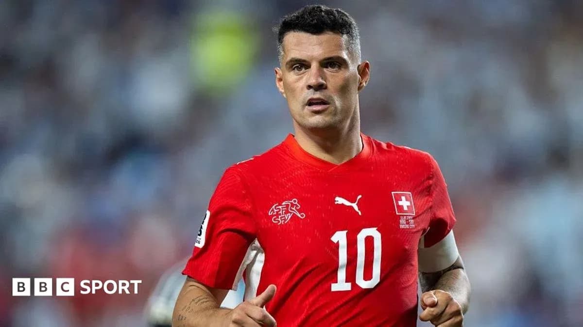 Swiss player in red jersey during match Swiss player in red jersey during match