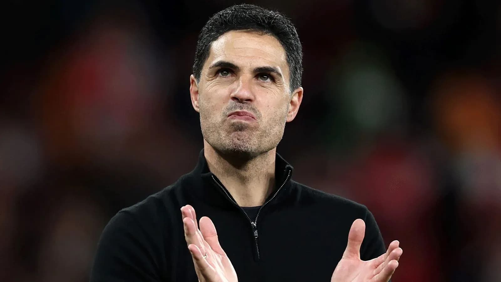 Manager applauding during a match Manager applauding during a match