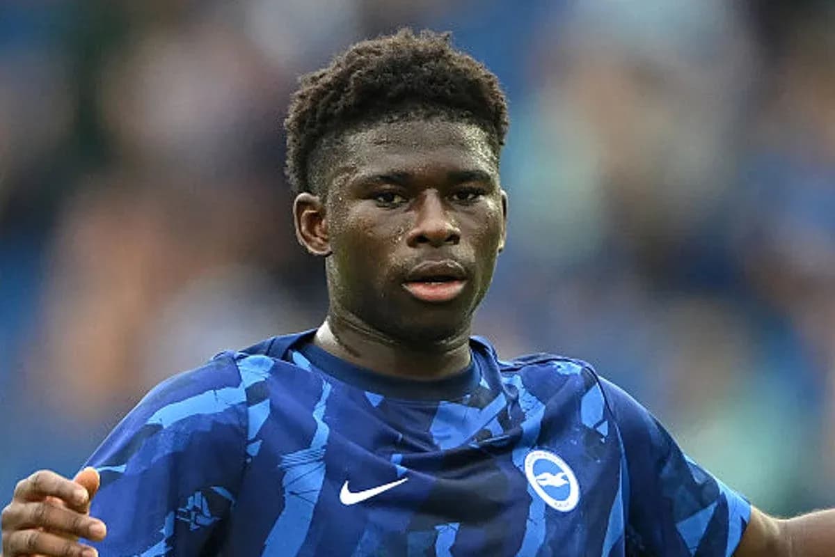 Player in blue kit during football match Player in blue kit during football match