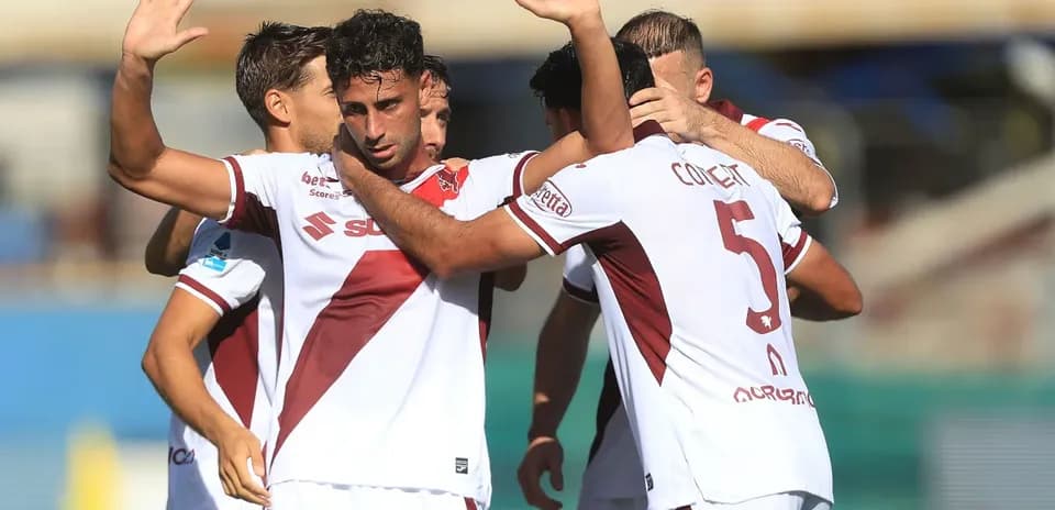 Torino players celebrating a goal during match Torino players celebrating a goal during match