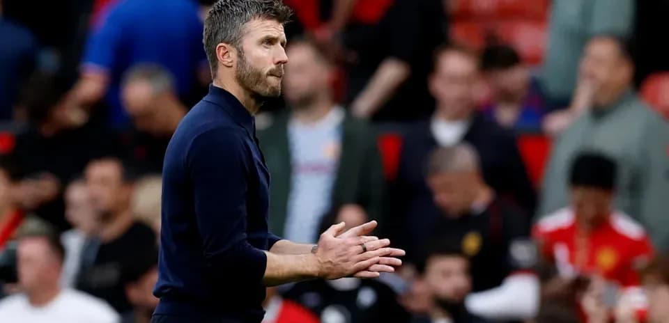 Manager clapping during a match at Old Trafford Manager clapping during a match at Old Trafford