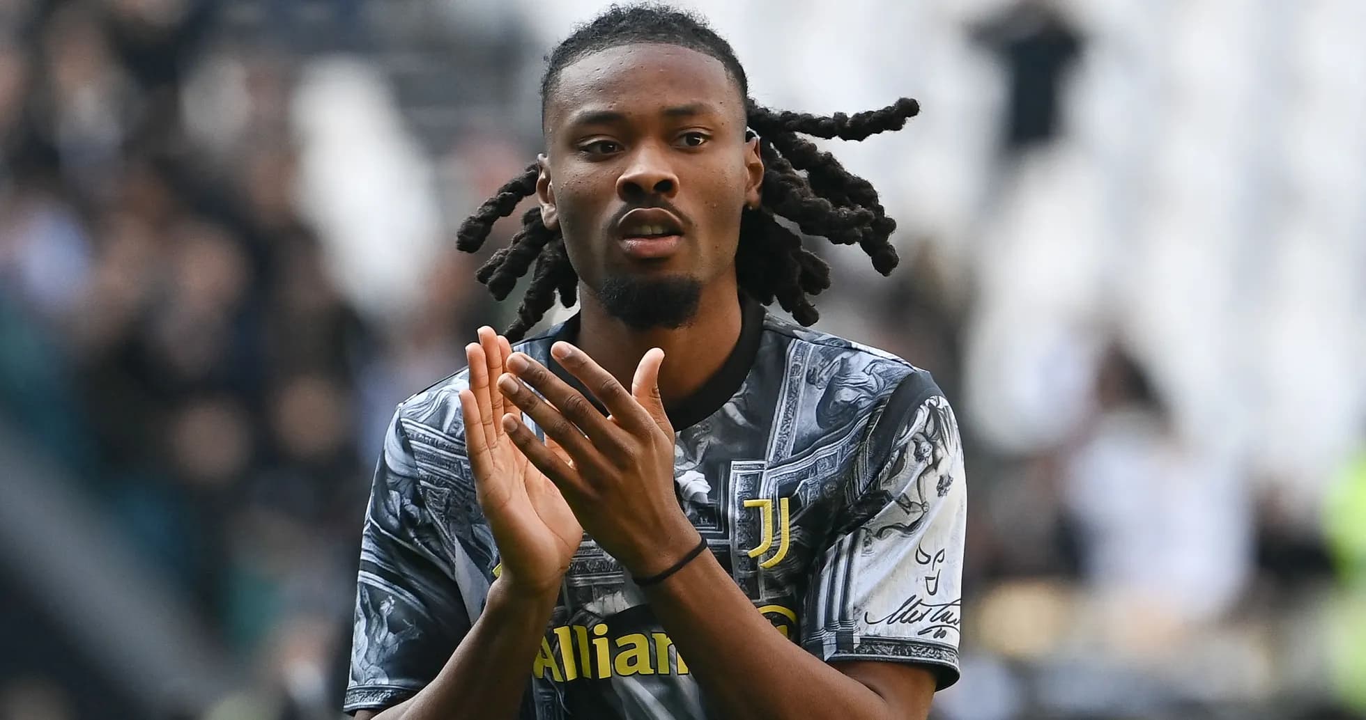 Player applauding fans during match at stadium Player applauding fans during match at stadium
