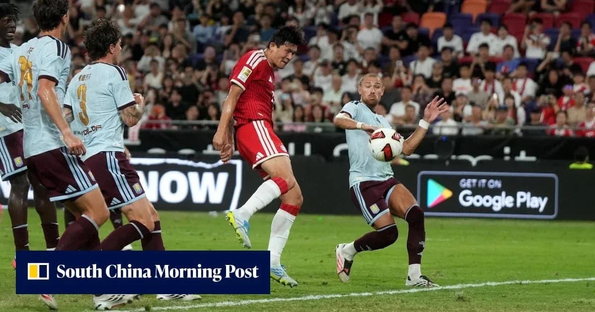 Player kicking ball near goal during match Player kicking ball near goal during match