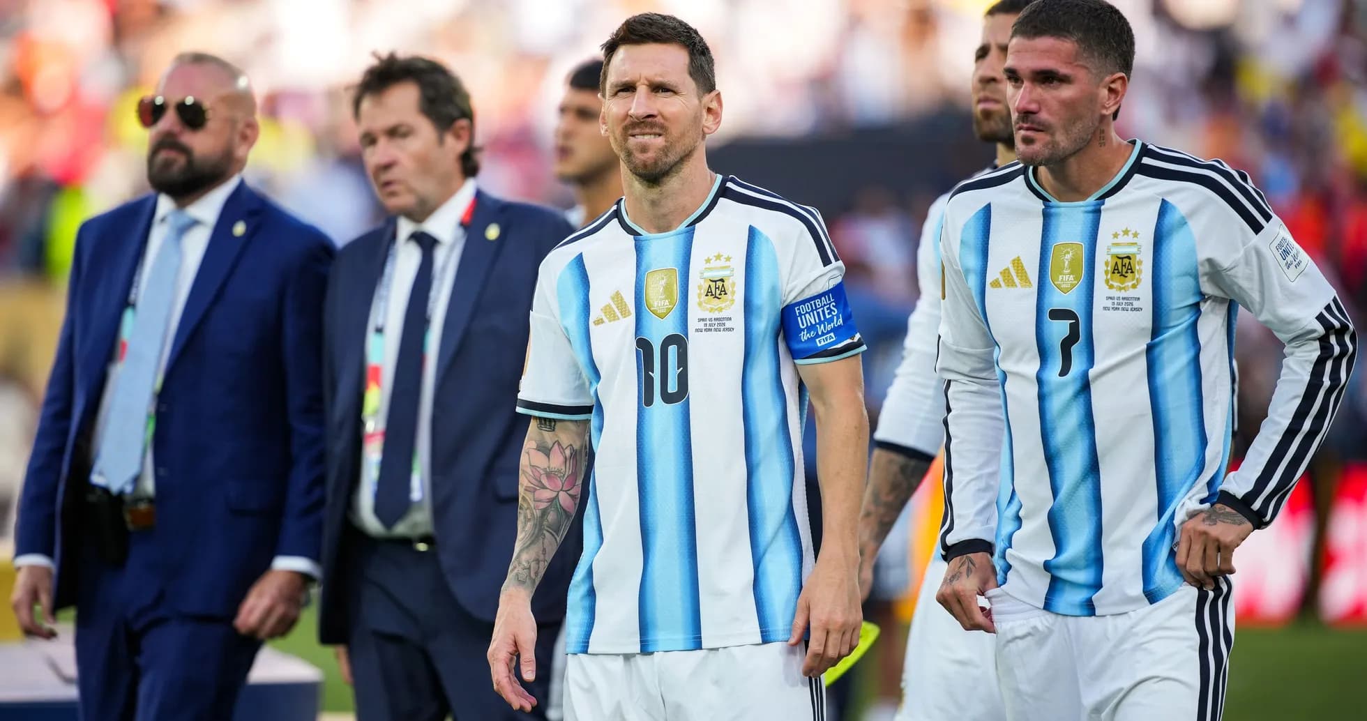 Lionel Messi walking with teammates after match Lionel Messi walking with teammates after match