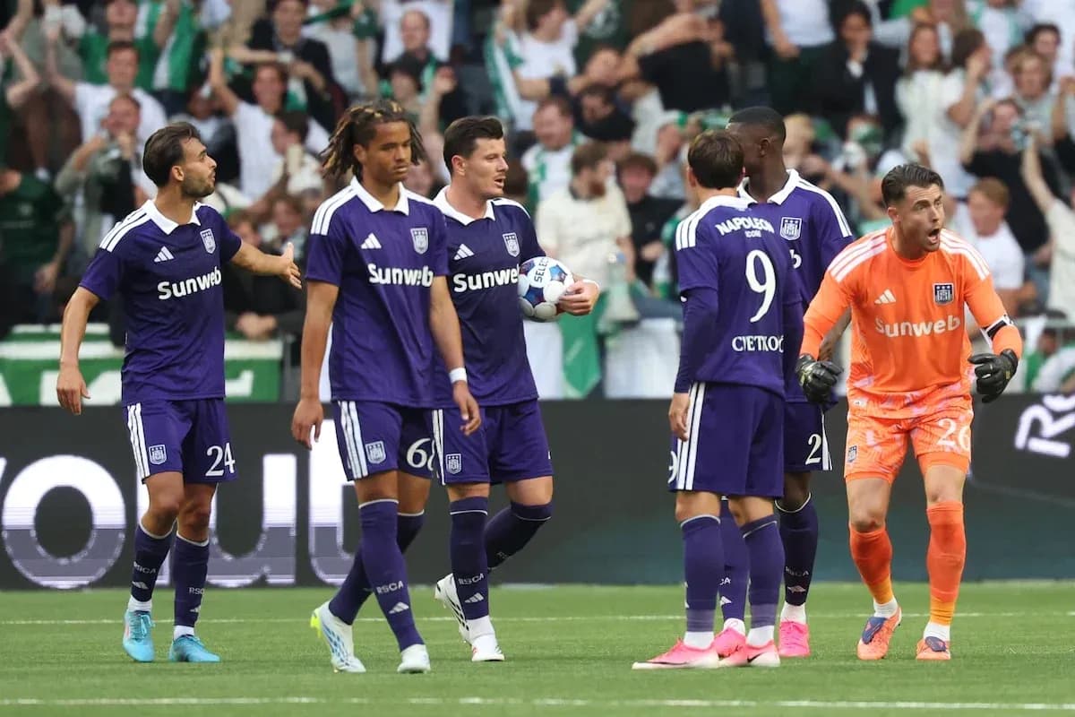 Anderlecht players celebrating during a match Anderlecht players celebrating during a match